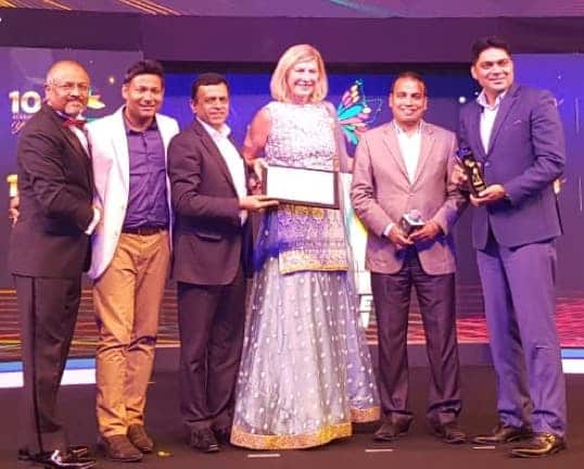 Ms-Cynthia-with-the-team-receiving-the-Award