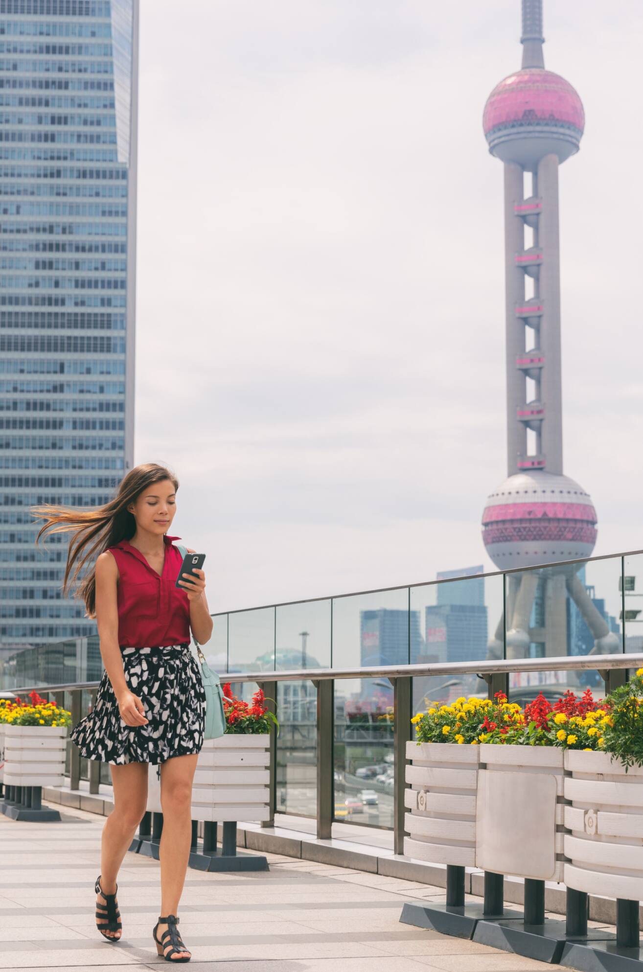 Walk the promenade along the Huangpu River 